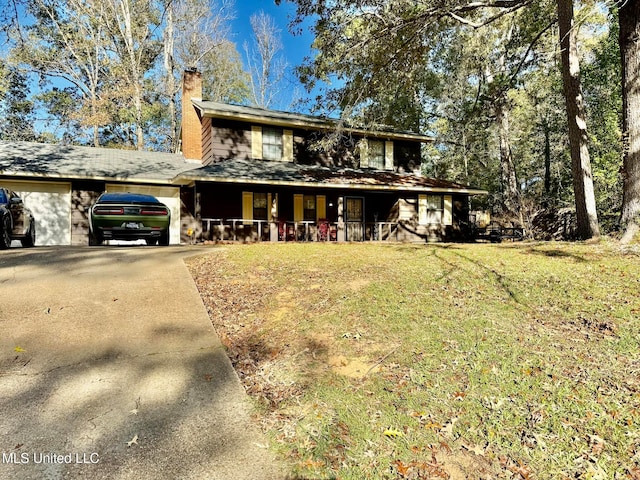 view of front of home with a porch and a front lawn