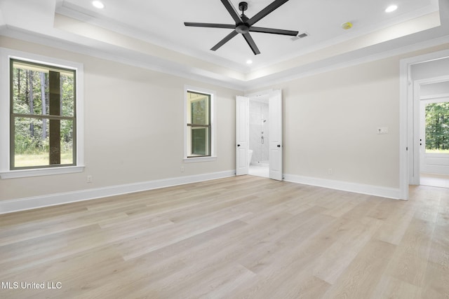 563 Valentine Rd, Holly Springs, MS 38635 - spare room featuring a raised ceiling, crown molding, a ceiling fan, light wood-style floors, and recessed lighting