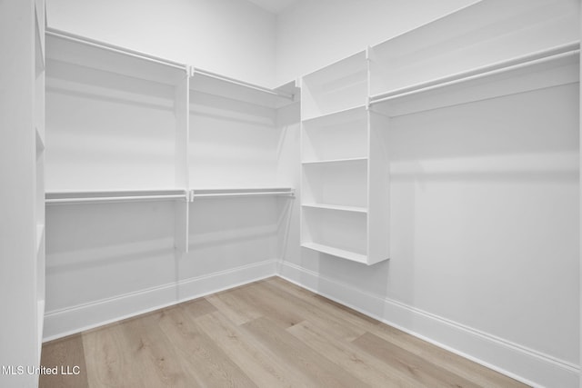 563 Valentine Rd, Holly Springs, MS 38635 - spacious closet with wood finished floors