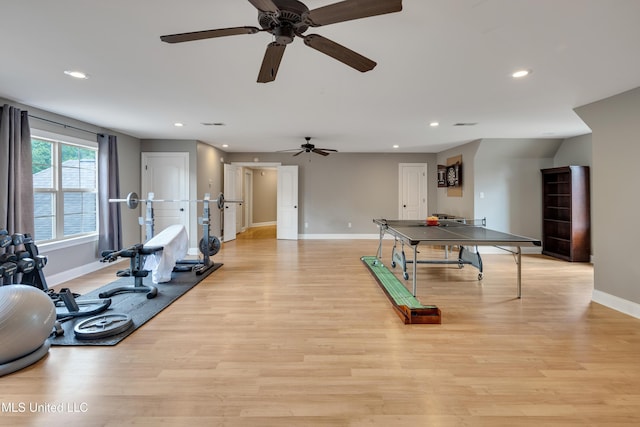 recreation room featuring baseboards, light wood-type flooring, ceiling fan, and recessed lighting