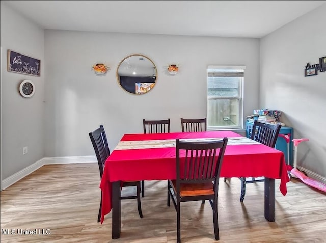 5065 Fairbury Way, Diberville, MS 39540 - dining space featuring wood finished floors and baseboards