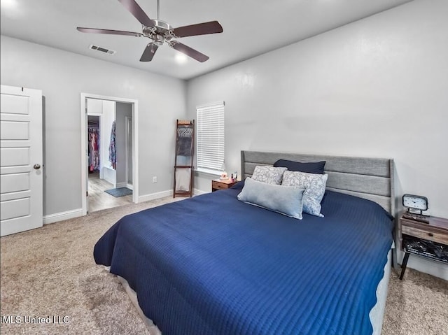 5065 Fairbury Way, Diberville, MS 39540 - bedroom with carpet flooring, ceiling fan, baseboards, and a walk in closet