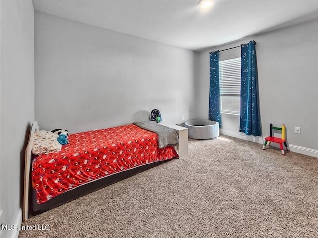 5065 Fairbury Way, Diberville, MS 39540 - bedroom featuring carpet floors and baseboards