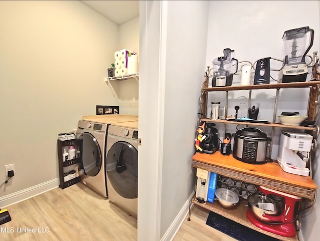5065 Fairbury Way, Diberville, MS 39540 - washroom with washing machine and clothes dryer, wood finished floors, and baseboards