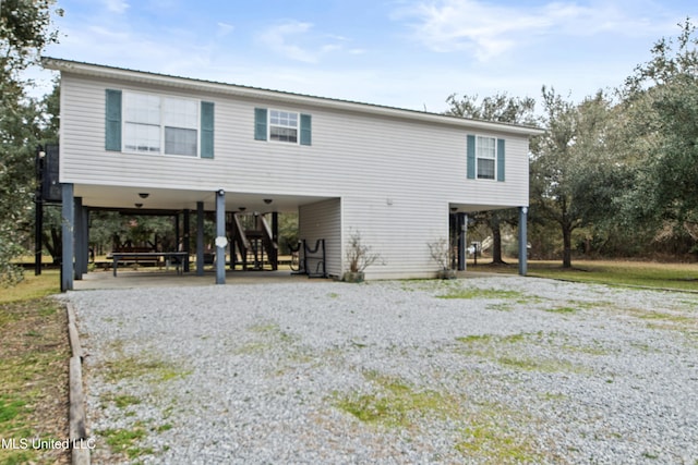 view of front of house featuring a carport