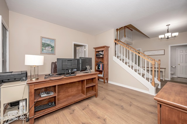 2204 Rue Beaux Chenes, Ocean Springs, MS 39564 - office with light wood-type flooring and a chandelier