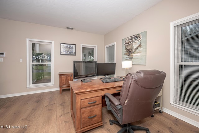 2204 Rue Beaux Chenes, Ocean Springs, MS 39564 - office space featuring baseboards and wood-type flooring