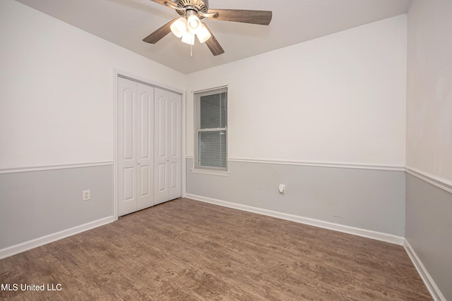 2204 Rue Beaux Chenes, Ocean Springs, MS 39564 - unfurnished bedroom with wood finished floors, a closet, and a ceiling fan