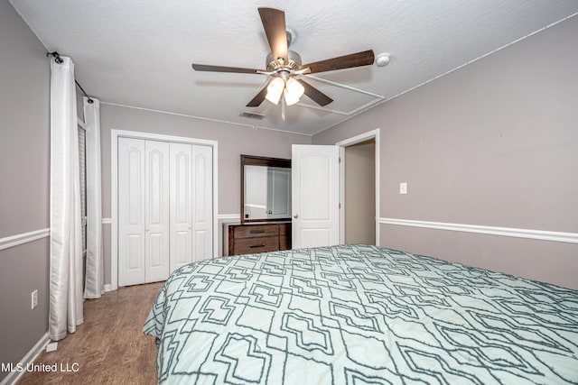 2204 Rue Beaux Chenes, Ocean Springs, MS 39564 - bedroom featuring wood finished floors, a closet, and ceiling fan