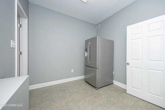 2204 Rue Beaux Chenes, Ocean Springs, MS 39564 - kitchen featuring stainless steel fridge with ice dispenser and light floors