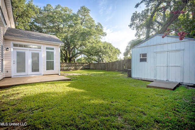2204 Rue Beaux Chenes, Ocean Springs, MS 39564 - fenced backyard featuring a shed and a patio area