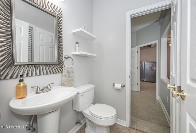 2204 Rue Beaux Chenes, Ocean Springs, MS 39564 - half bathroom featuring toilet and tile patterned floors