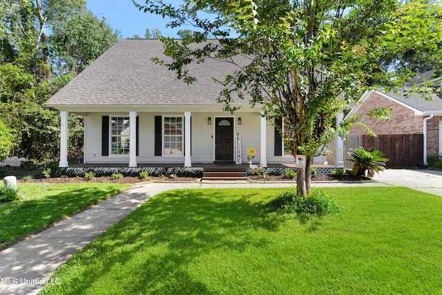 view of front of property with a front lawn