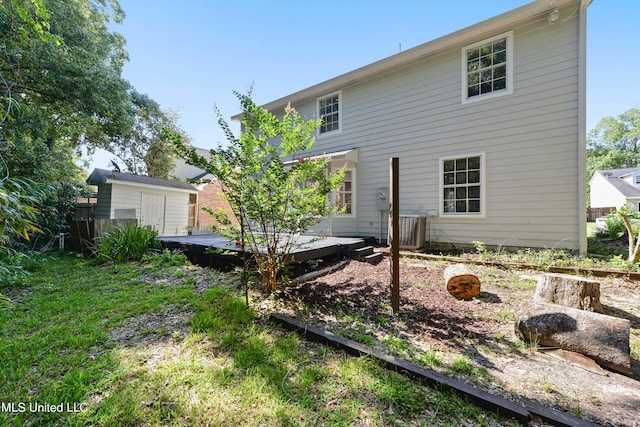 rear view of property featuring a deck