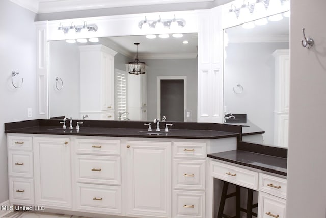 bathroom featuring vanity and ornamental molding