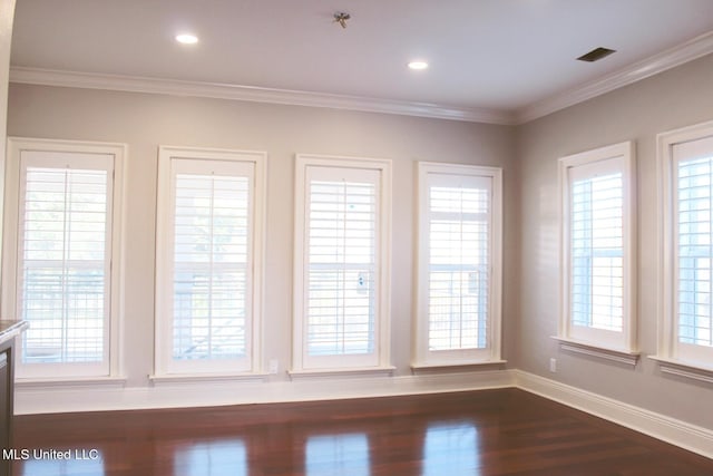 interior space featuring dark hardwood / wood-style flooring and crown molding