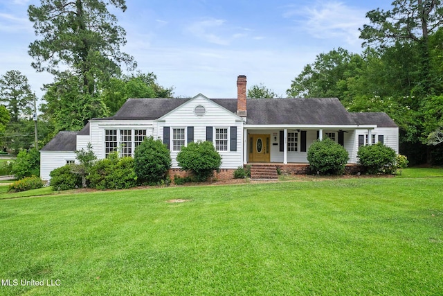 300 S 21st Ave, Hattiesburg, MS 39401 - ranch-style house featuring covered porch, a chimney, a front yard, and roof with shingles
