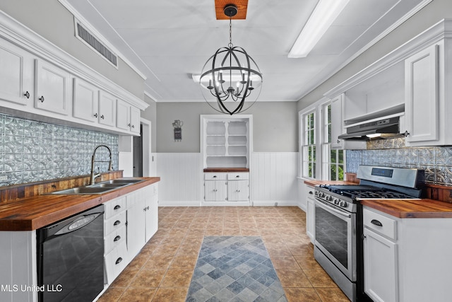 300 S 21st Ave, Hattiesburg, MS 39401 - kitchen featuring stainless steel range with gas cooktop, dishwasher, wooden counters, a sink, and under cabinet range hood