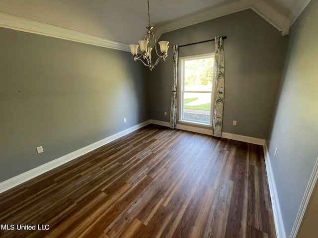 spare room with an inviting chandelier, crown molding, dark wood-type flooring, and vaulted ceiling