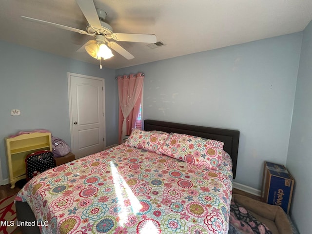 bedroom featuring ceiling fan