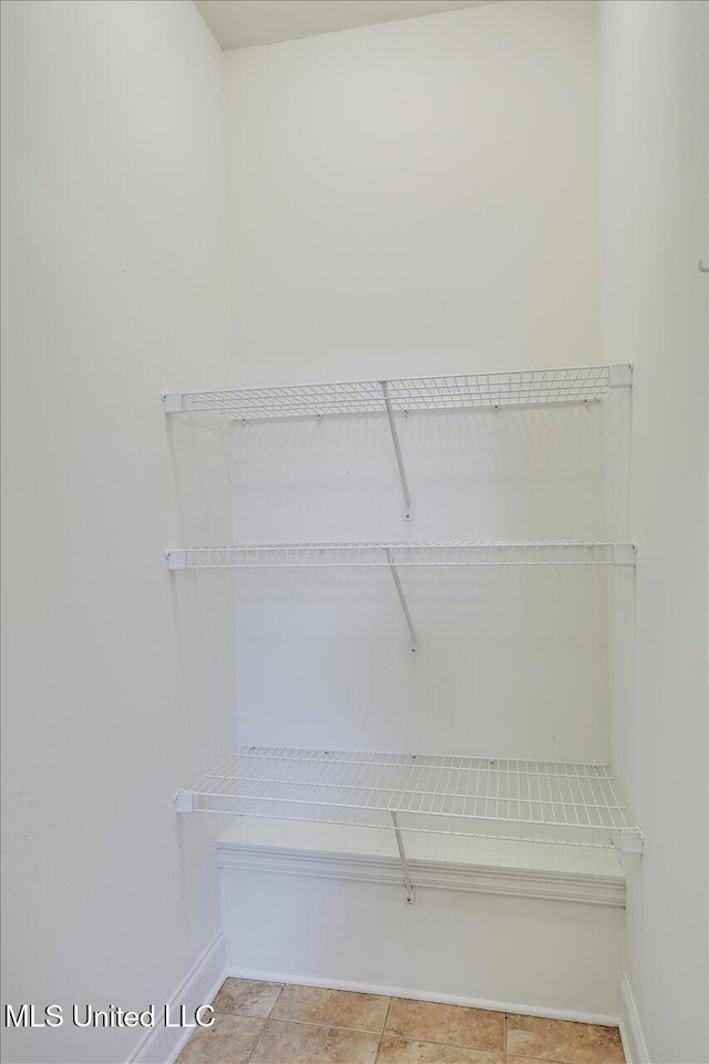 409 Sand Stone Pl, Brandon, MS 39042 - spacious closet with light tile patterned floors