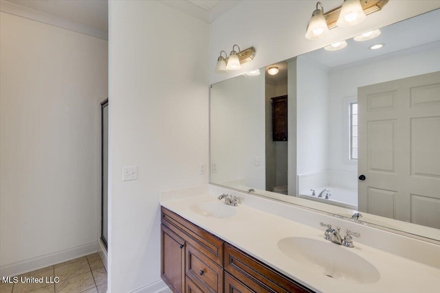 409 Sand Stone Pl, Brandon, MS 39042 - full bathroom with double vanity, a garden tub, tile patterned floors, and a shower with shower door