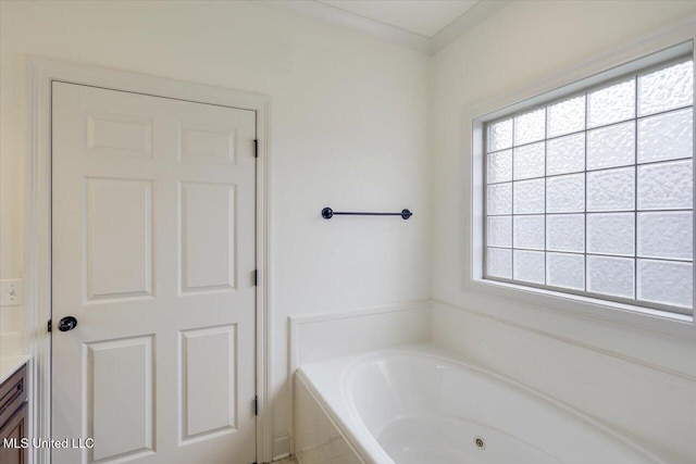 409 Sand Stone Pl, Brandon, MS 39042 - full bath featuring a tub with jets and vanity
