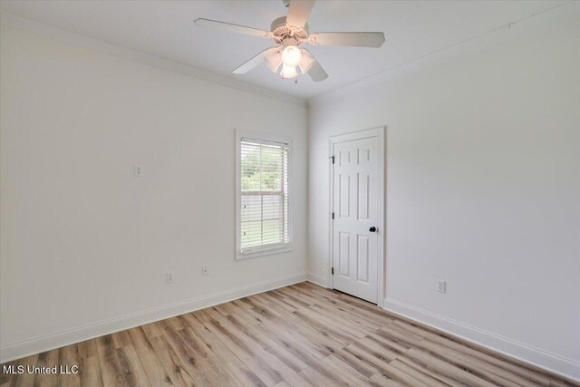 409 Sand Stone Pl, Brandon, MS 39042 - spare room with light wood-style flooring, a ceiling fan, and ornamental molding