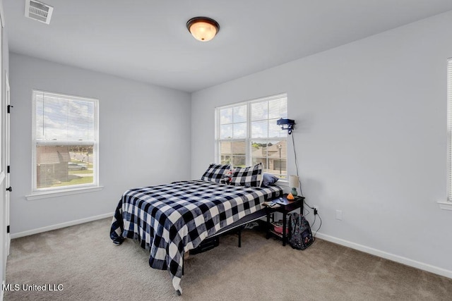 16904 Desmare St, Gulfport, MS 39503 - carpeted bedroom with baseboards