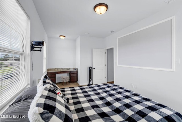 16904 Desmare St, Gulfport, MS 39503 - carpeted bedroom featuring baseboards