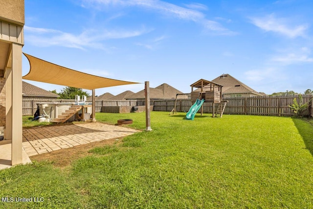 16904 Desmare St, Gulfport, MS 39503 - fenced backyard featuring a playground, a patio, and stairs
