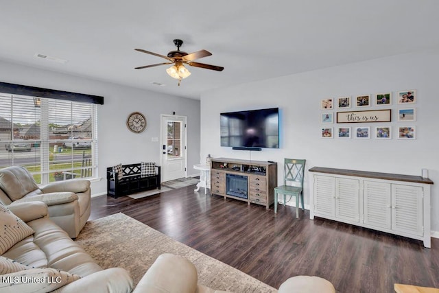 16904 Desmare St, Gulfport, MS 39503 - living area featuring a ceiling fan and wood finished floors