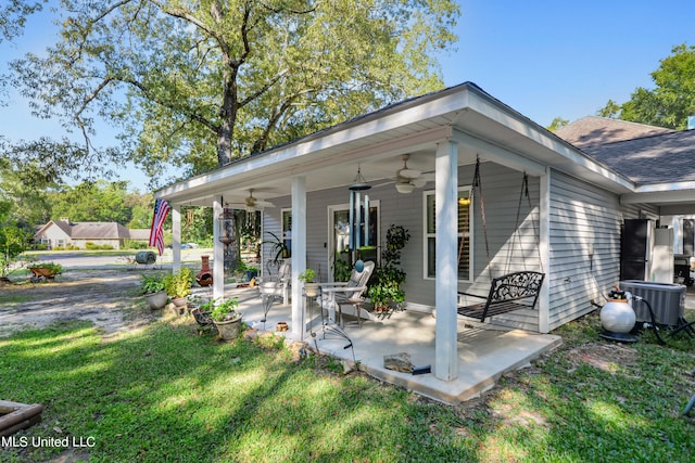 exterior space with central air condition unit and ceiling fan