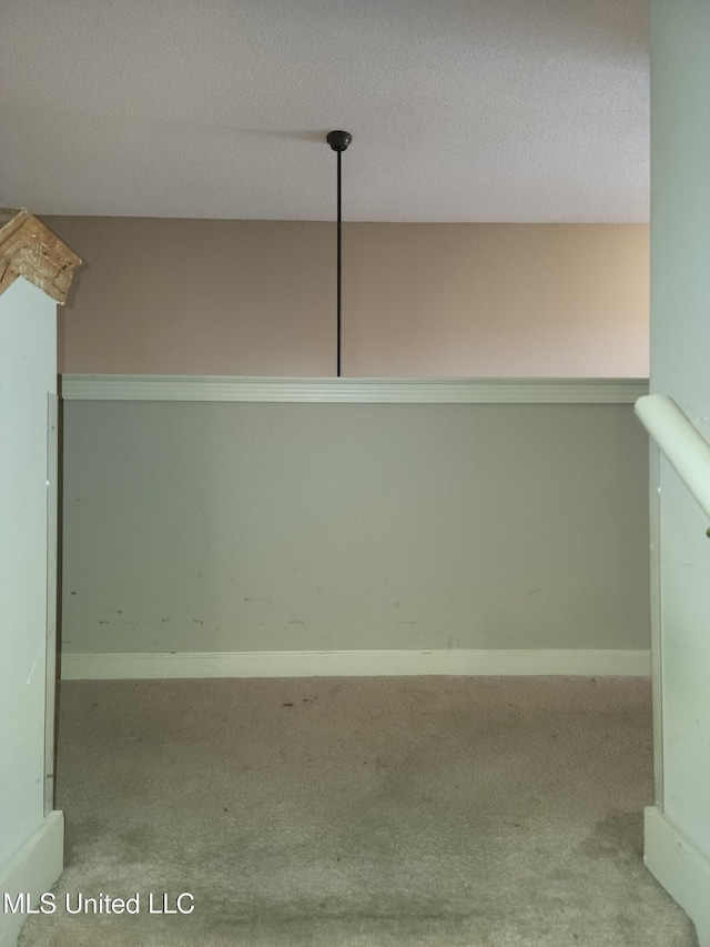 7295 Madelyn Cv, Horn Lake, MS 38637 - detailed view of carpet floors and a textured ceiling