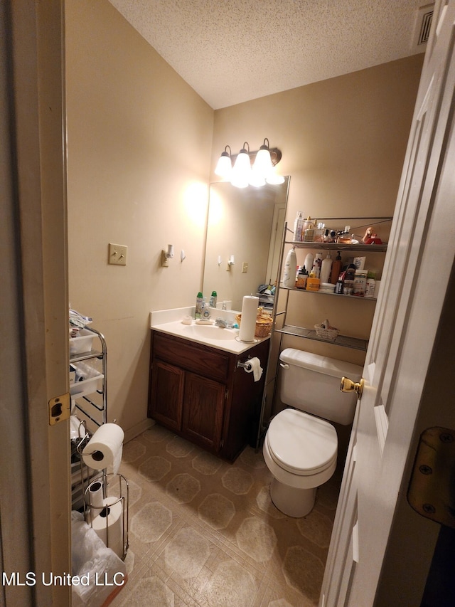 7295 Madelyn Cv, Horn Lake, MS 38637 - half bathroom featuring vanity and a textured ceiling