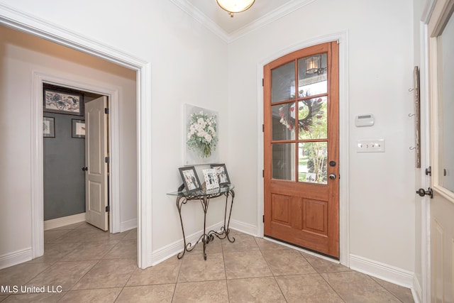 3927 Acadian Village Dr, Ocean Springs, MS 39564 - entryway featuring ornamental molding and light tile patterned floors