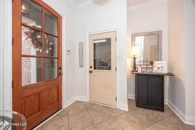 3927 Acadian Village Dr, Ocean Springs, MS 39564 - entrance foyer with crown molding and light tile patterned floors