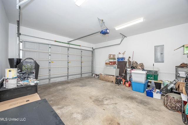 3927 Acadian Village Dr, Ocean Springs, MS 39564 - garage featuring electric panel and a garage door opener