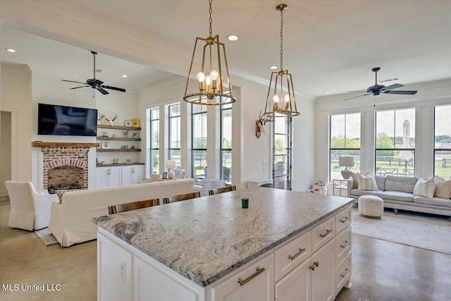 110 Crossview Pl, Brandon, MS 39047 - kitchen featuring open floor plan, a ceiling fan, healthy amount of natural light, and recessed lighting