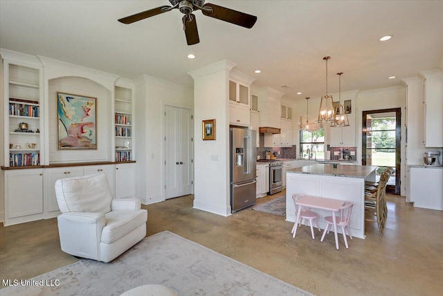 110 Crossview Pl, Brandon, MS 39047 - kitchen with stainless steel appliances, ceiling fan, finished concrete flooring, a kitchen island, and recessed lighting