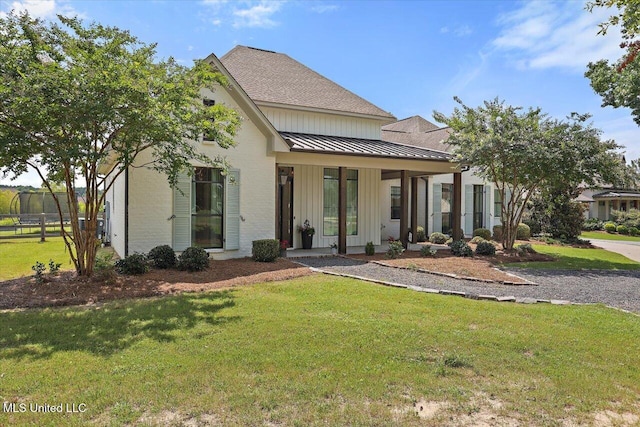 110 Crossview Pl, Brandon, MS 39047 - modern farmhouse style home with a standing seam roof, board and batten siding, a metal roof, roof with shingles, and covered porch