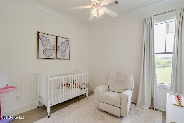 110 Crossview Pl, Brandon, MS 39047 - bedroom with a crib and ceiling fan
