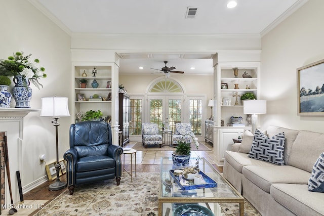 29 Avery Cir, Jackson, MS 39211 - living area with crown molding, ceiling fan, wood finished floors, recessed lighting, and french doors