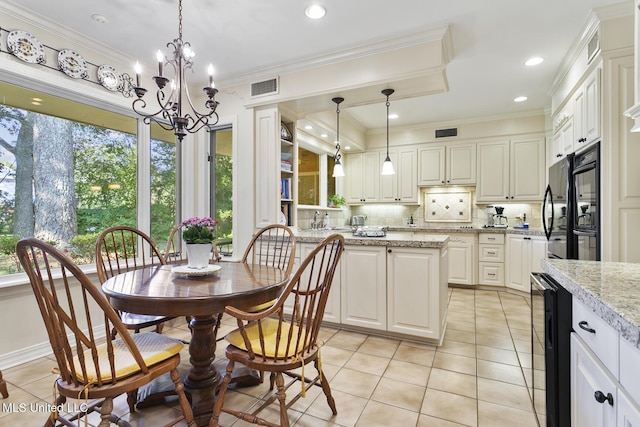 29 Avery Cir, Jackson, MS 39211 - dining area with light tile patterned floors, a chandelier, beverage cooler, ornamental molding, and recessed lighting