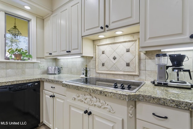 29 Avery Cir, Jackson, MS 39211 - kitchen with black appliances, decorative backsplash, and white cabinetry