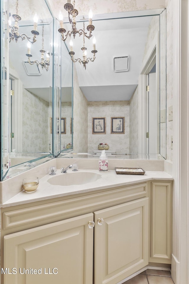 29 Avery Cir, Jackson, MS 39211 - bathroom featuring vanity, a chandelier, and tile patterned flooring