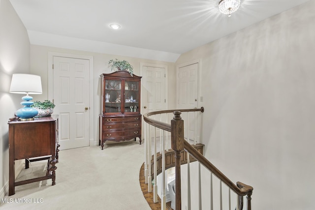 29 Avery Cir, Jackson, MS 39211 - hallway featuring an upstairs landing, light carpet, and recessed lighting
