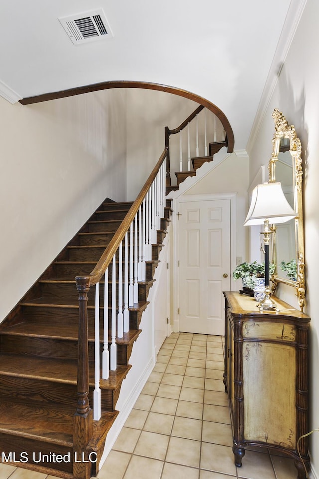 29 Avery Cir, Jackson, MS 39211 - stairs with tile patterned flooring and crown molding