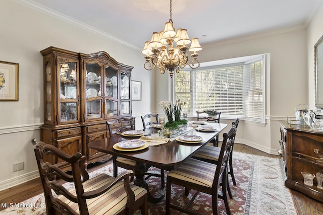 29 Avery Cir, Jackson, MS 39211 - dining room featuring a chandelier, crown molding, and wood finished floors