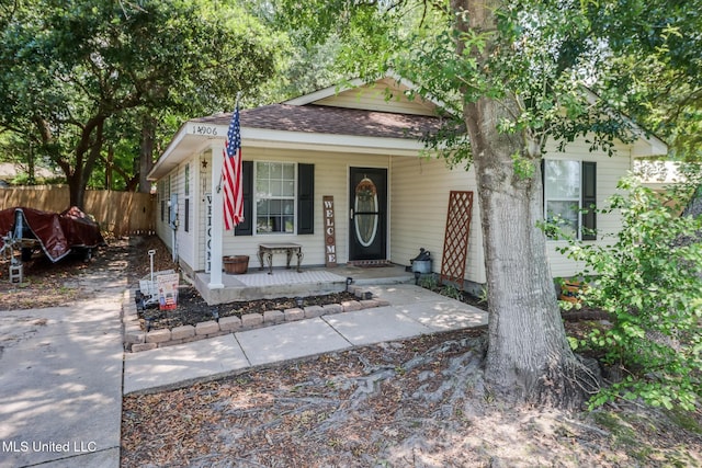 14906 Angela Dr, Gulfport, MS 39503 - view of front facade with a porch and roof with shingles